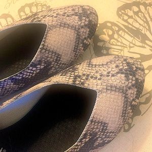 Snake print Skechers flats